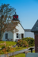 Burnt Island Light Among Gardens in Maine